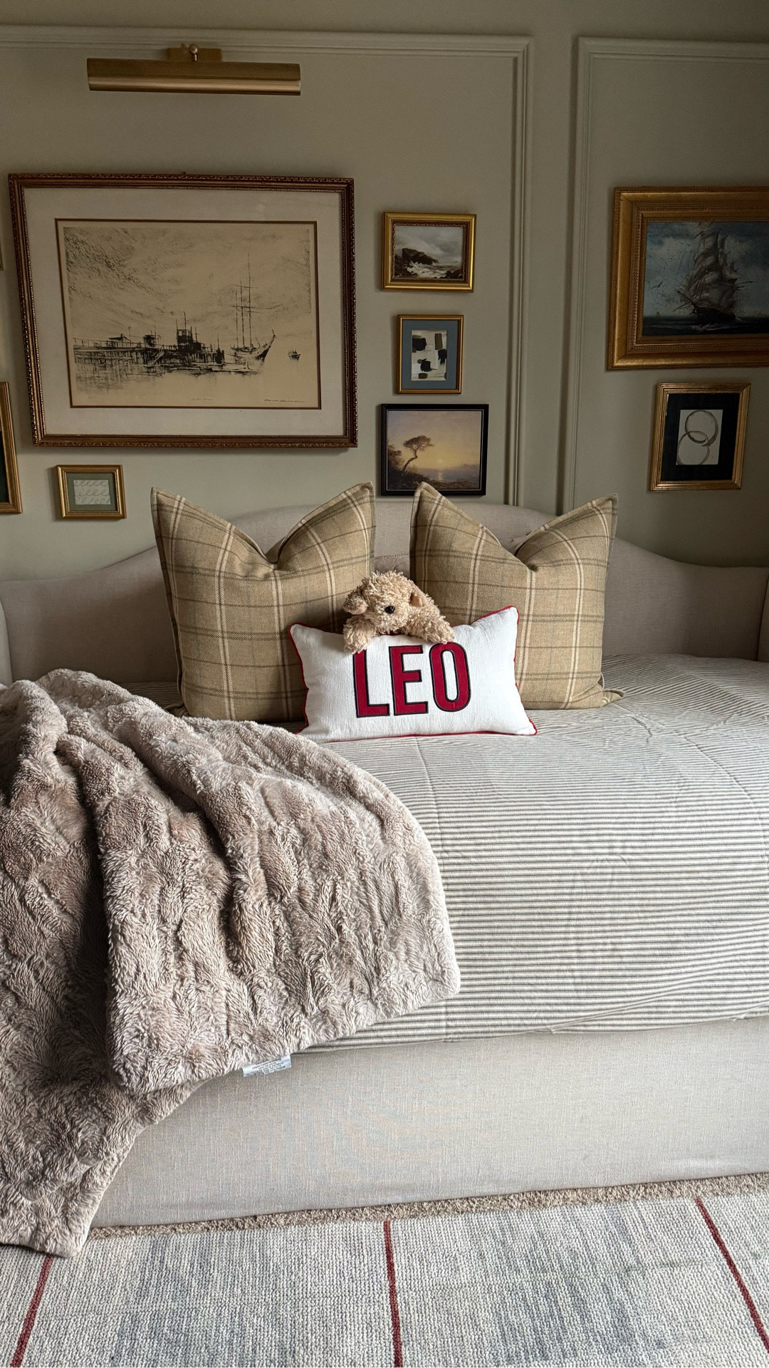 The before and after of my son’s bedroom is so fun to look back on. I remember being nervous to paint the room in a darker color. I must say, I’m so happy I ended up color drenching this space.  No regrets!  The gallery wall was also my way of designing around the fact that his bed has to be off center, and I think it totally works!  It was also a budget friendly way to go because all of the frames are super inexpensive thrifted find, and DIY art mixed in with some very low cost prints. It all came together so nicely, don’t you think? 

#LTKHome