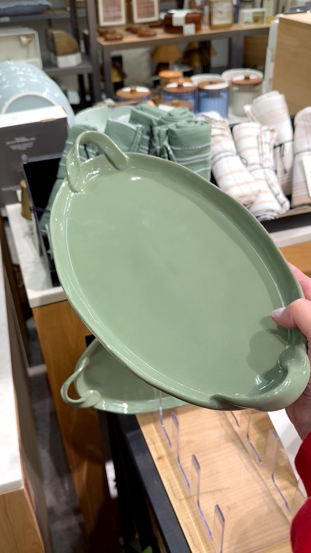 This decorative ceramic tray has a beautiful spring vibe! It’s oval shaped, with a green glaze, and has a handmade feel. And just look at the cute handles! ✨

It’s perfect for a coffee table, entryway, sideboard, or bathroom. It’s the spring home decor item to display your candles and matchsticks cloche, picture frames, or jewelry.

And if you’re a mosaic artist, this would also make a great substrate for your tile work. For mosaic tips, tutorials + inspiration please visit my YouTube channel: YouTube.com/julieweilbacher, and follow @julieweilbacher on Instagram.

#ceramictray #decorativetray  #springhomdecor #traywithhandles #target #mosaic #ovaltray #coffeetabledecor

#LTKHome #LTKSeasonal