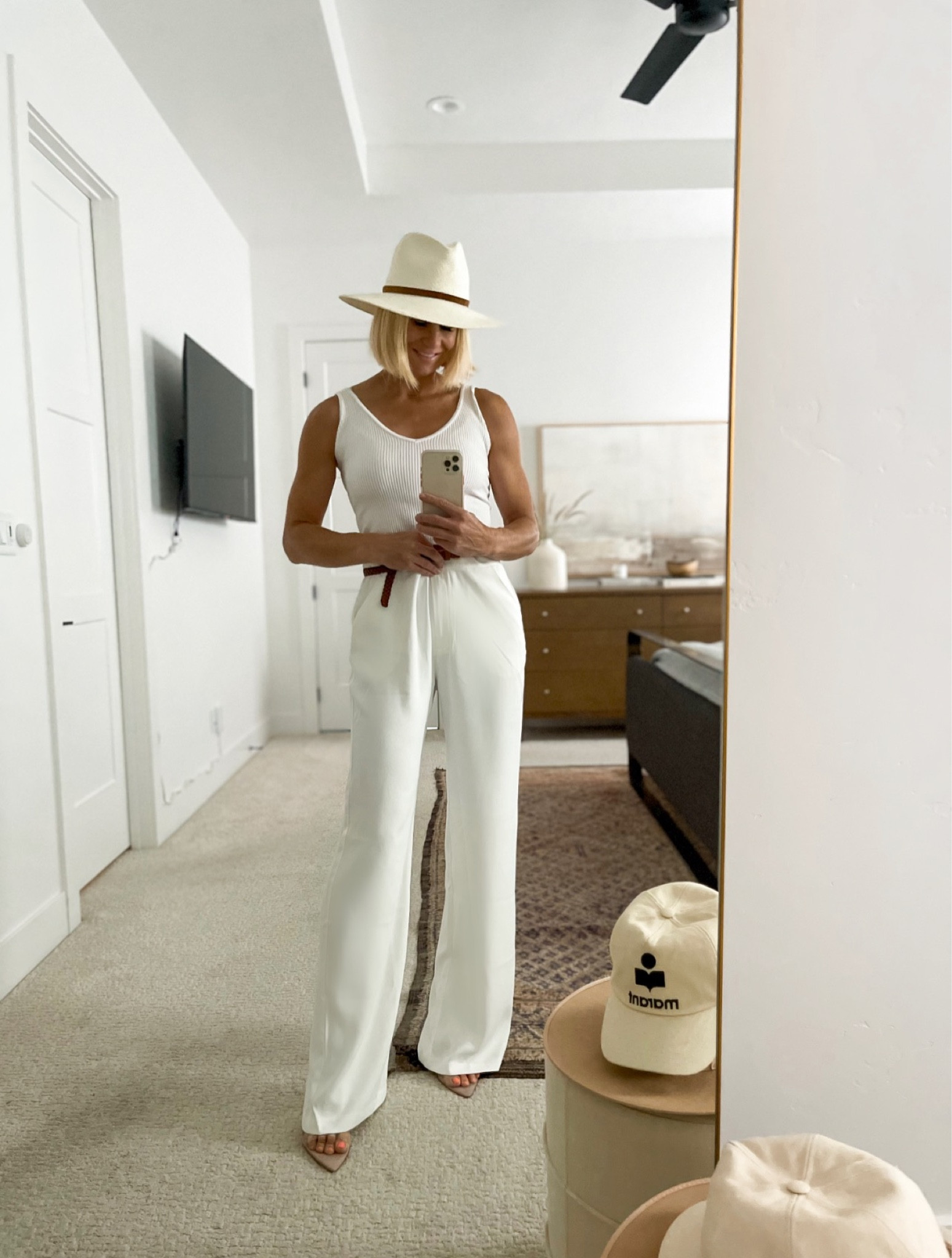 Monochromatic summer outfit idea! 
Budget friendly tank and trousers — both in more colors! Size DOWN in pants. Wearing medium here, but re/ordered size small. Wearing m/l tank for length. Amazon clear strappy sandals look just like designer! 


#LTKFind #LTKunder100 #LTKSeasonal