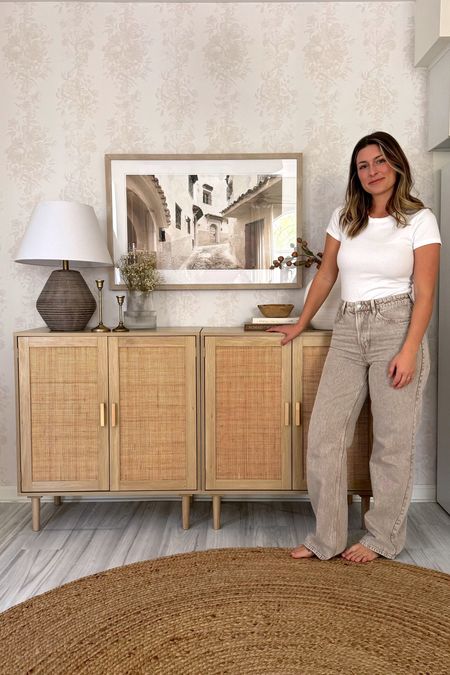 Cane Cabinets from Amazon on sale right now for 45% off!
Cabinets come with two handle options- black and wood!

I’m wearing a size 8 in these wide leg jeans. Usually wear a 6 so I sized up. I’m 5’6!
Wearing a small in the tshirt :)

Neutral decor, organic modern decor, home decor finds, wooden cabinets, cabinet, spring outfit, wide leg jeans, neutral clothing 

#LTKstyletip #LTKsalealert #LTKhome