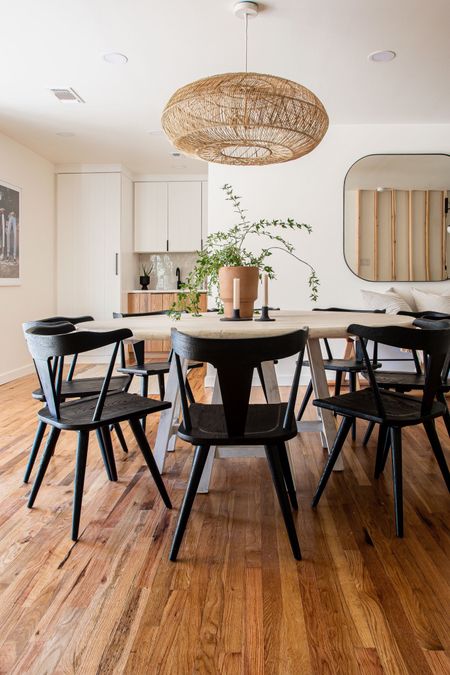 The big beautiful round dining table at Koselig Hus in Fredericksburg Texas seats 8 in these stylish black chairs. 

Find my rental house on Airbnb and come have a stay in the Texas Wine Country

#diningtable #roundtable #luxuryfurniture #highdesign 

#LTKstyletip #LTKhome