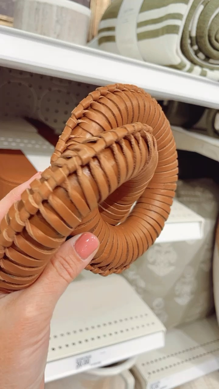 These round leather links make for fun coffee table decor! From Threshold/Studio McGee collection at Target. 

#homedecor #coffeetabledecor #shelfdecor 

#LTKhome