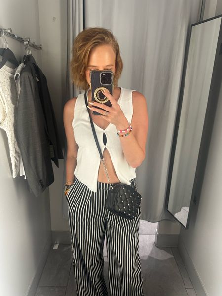 Women’s vintage crochet open front v neck tank vest top 
Wide leg black and white striped trousers 

#LTKSeasonal #LTKU #LTKFindsUnder50