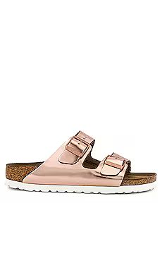 BIRKENSTOCK Arizona Soft Footbed Sandal in Metallic Copper from Revolve.com | Revolve Clothing (Global)