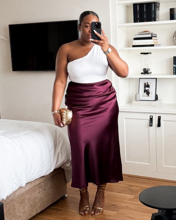 A little pop of colour with this beautiful burgundy satin skirt, paired with some gold accessories and shoes!

#LTKpartywear #LTKuk #LTKstyletip