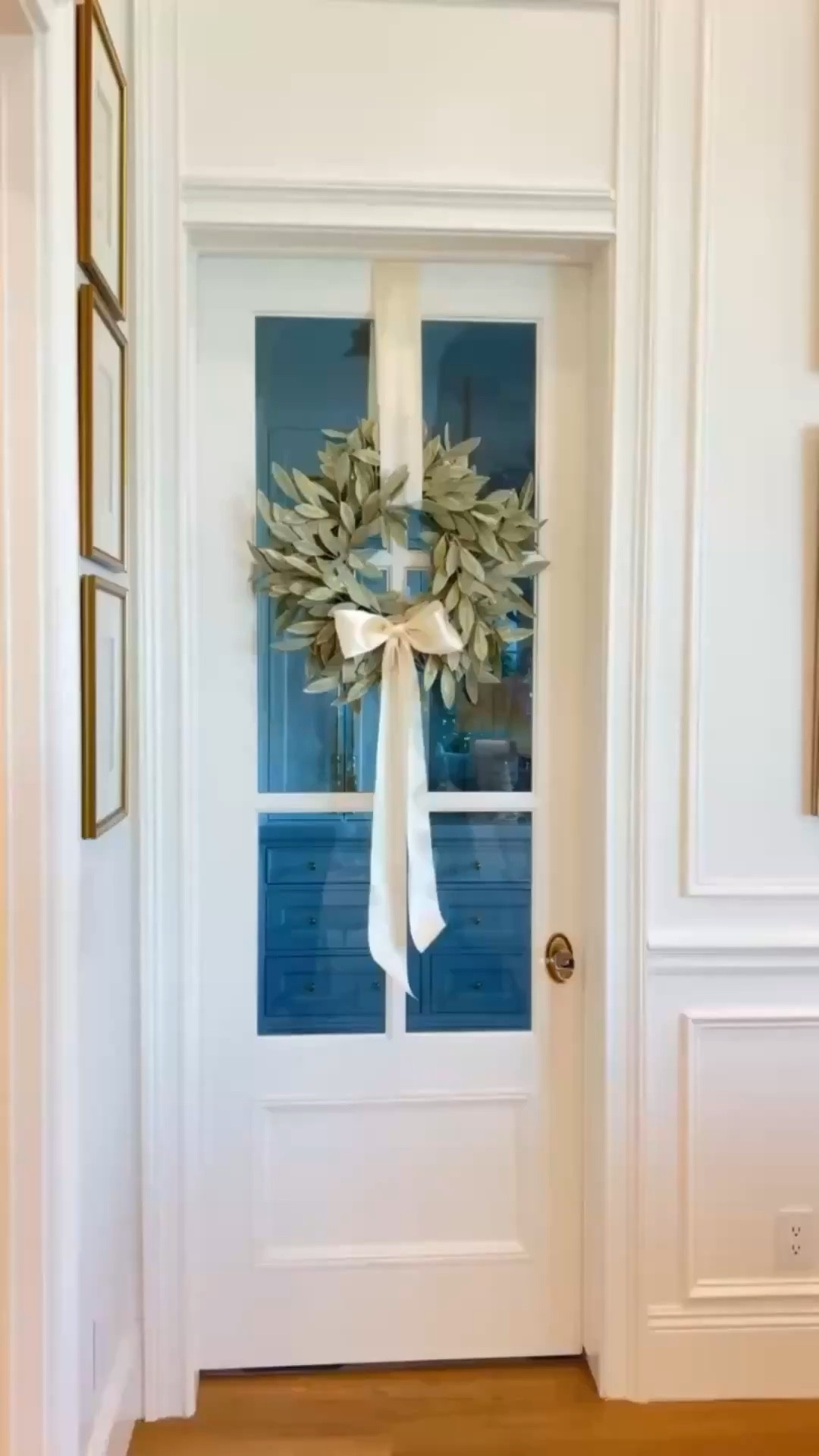 The prettiest wreath, hung with double sided satin ribbon! 

#LTKSeasonal #LTKHome
