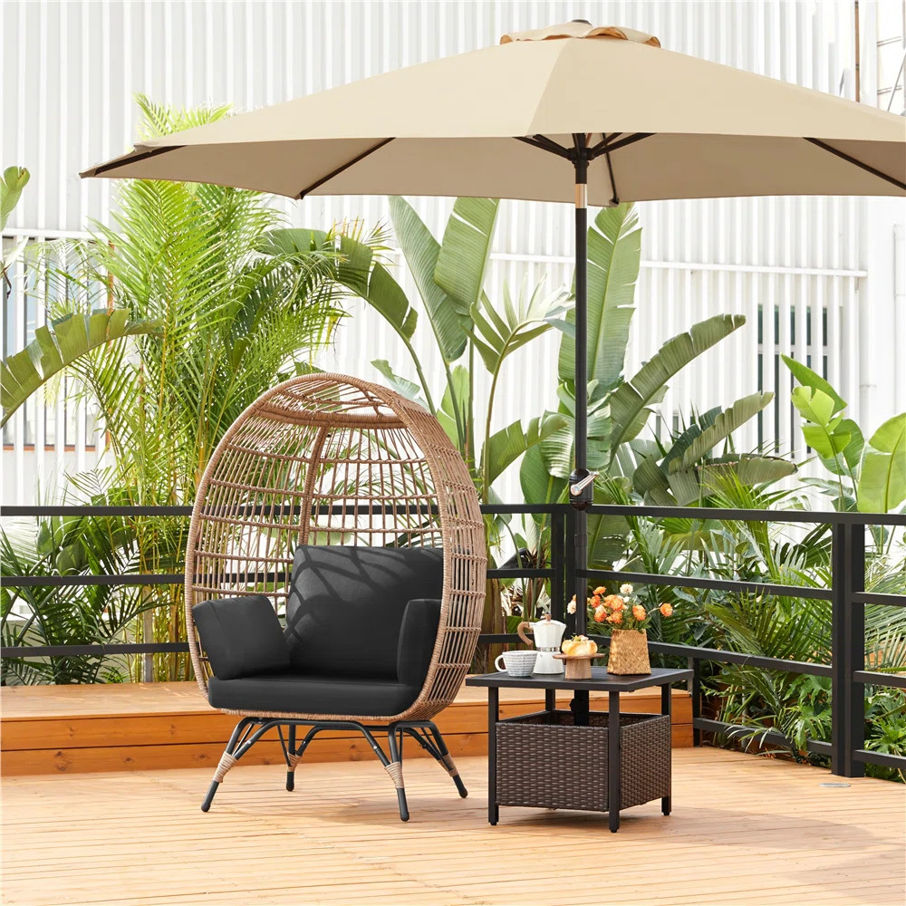 Cynthie HDPE Rattan Indoor& Outdoor Egg-shaped Lounge Chair with 4 Cushions | Wayfair North America