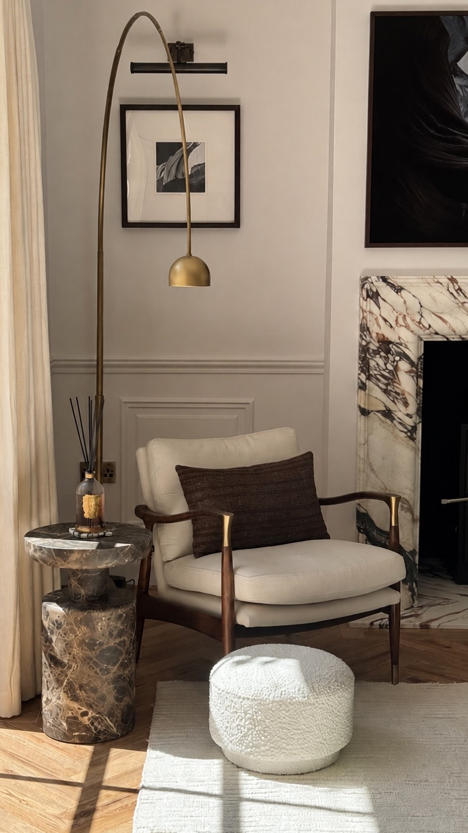 Affordable quiet luxury bedroom. Soft, brown pillow, cover, striped textured farmhouse, gold floor lamp, chic arc lamp, upholstered, bouclé, ottoman, LED picture, light, mid-century, modern armchair, wool hand, tufted striped area rug. ￼

#LTKHome #LTKSaleAlert
