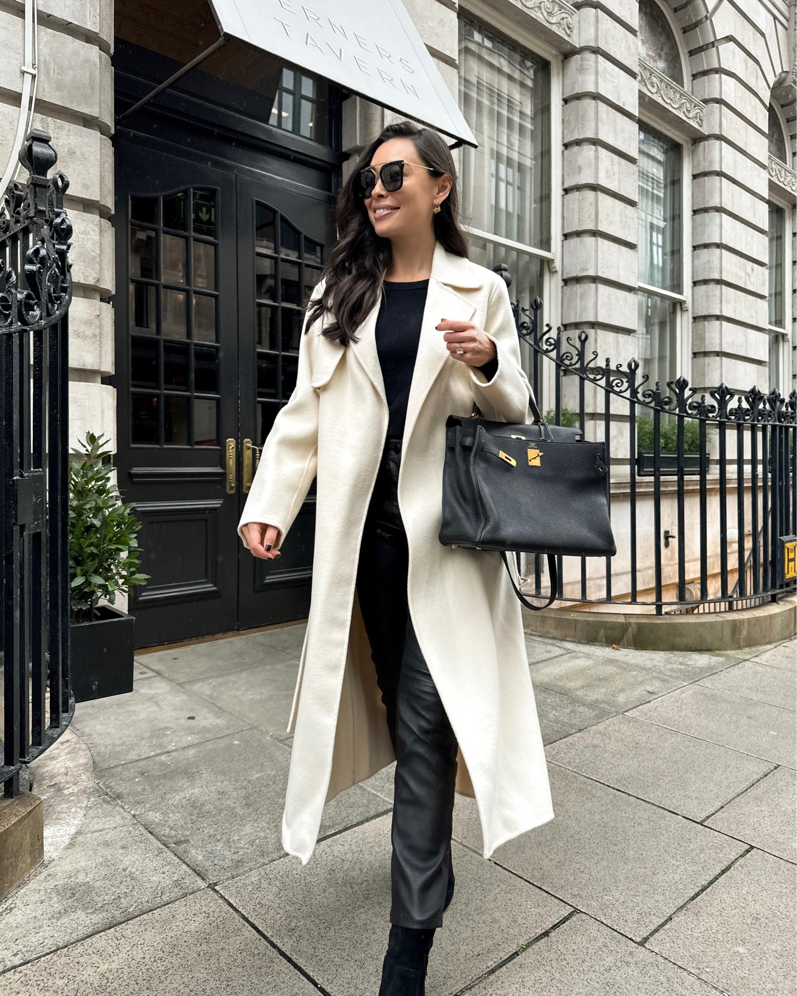 Kat Jamieson wears a cream coat, leather pants and an Hermes bag. Fall outfit, classic style. 

#LTKHoliday #LTKitbag #LTKSeasonal