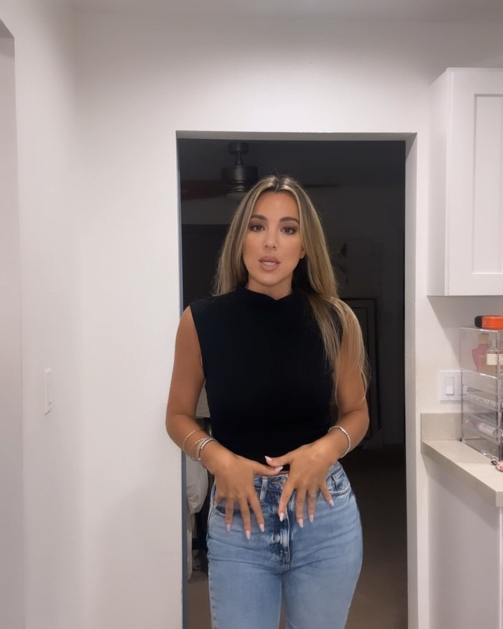 Top is less than $20 and I’m wearing a small. Shoes are almost 40% off right now and run true to size so comfy. My jeans are old Zara! 