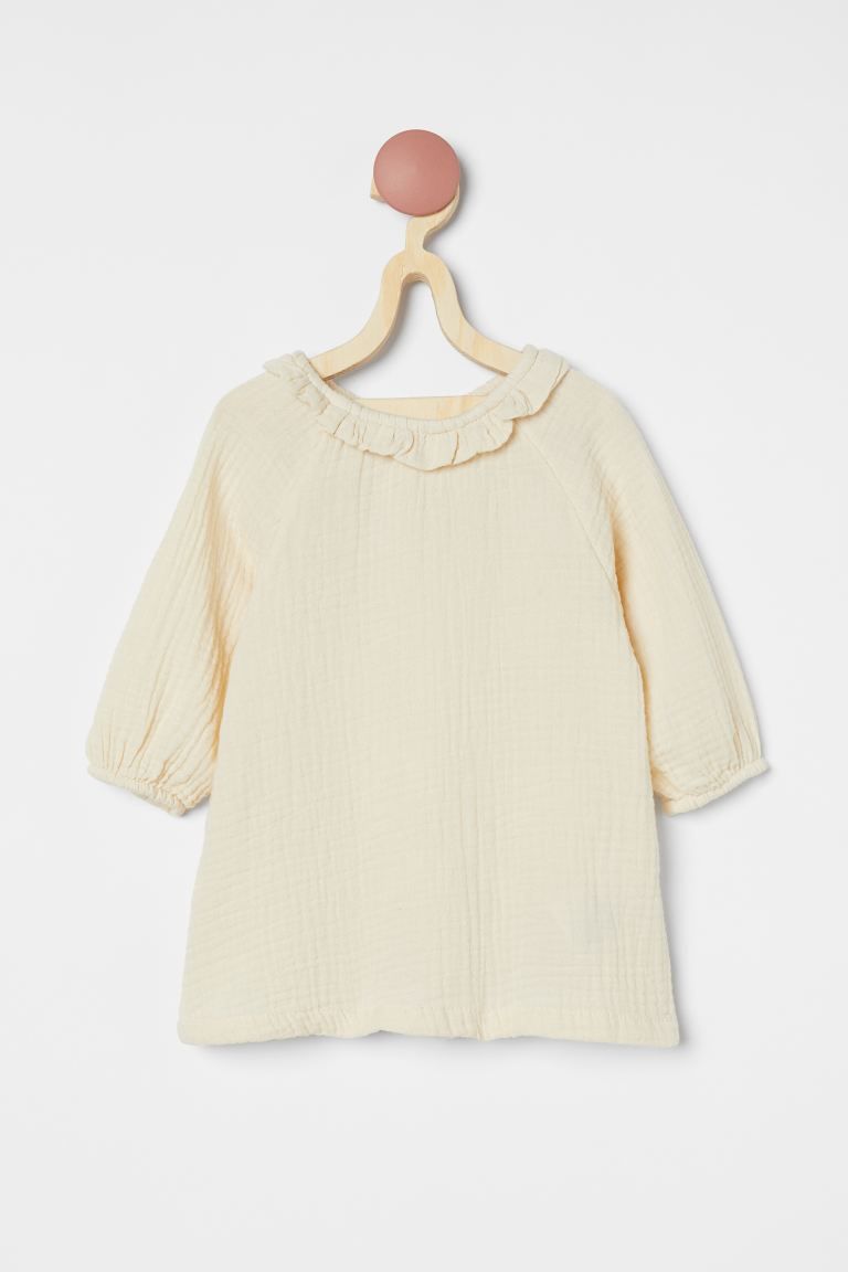 Baby Exclusive. Dress in textured, double-weave cotton fabric. Ruffled, double-layered collar, bu... | H&M (US + CA)
