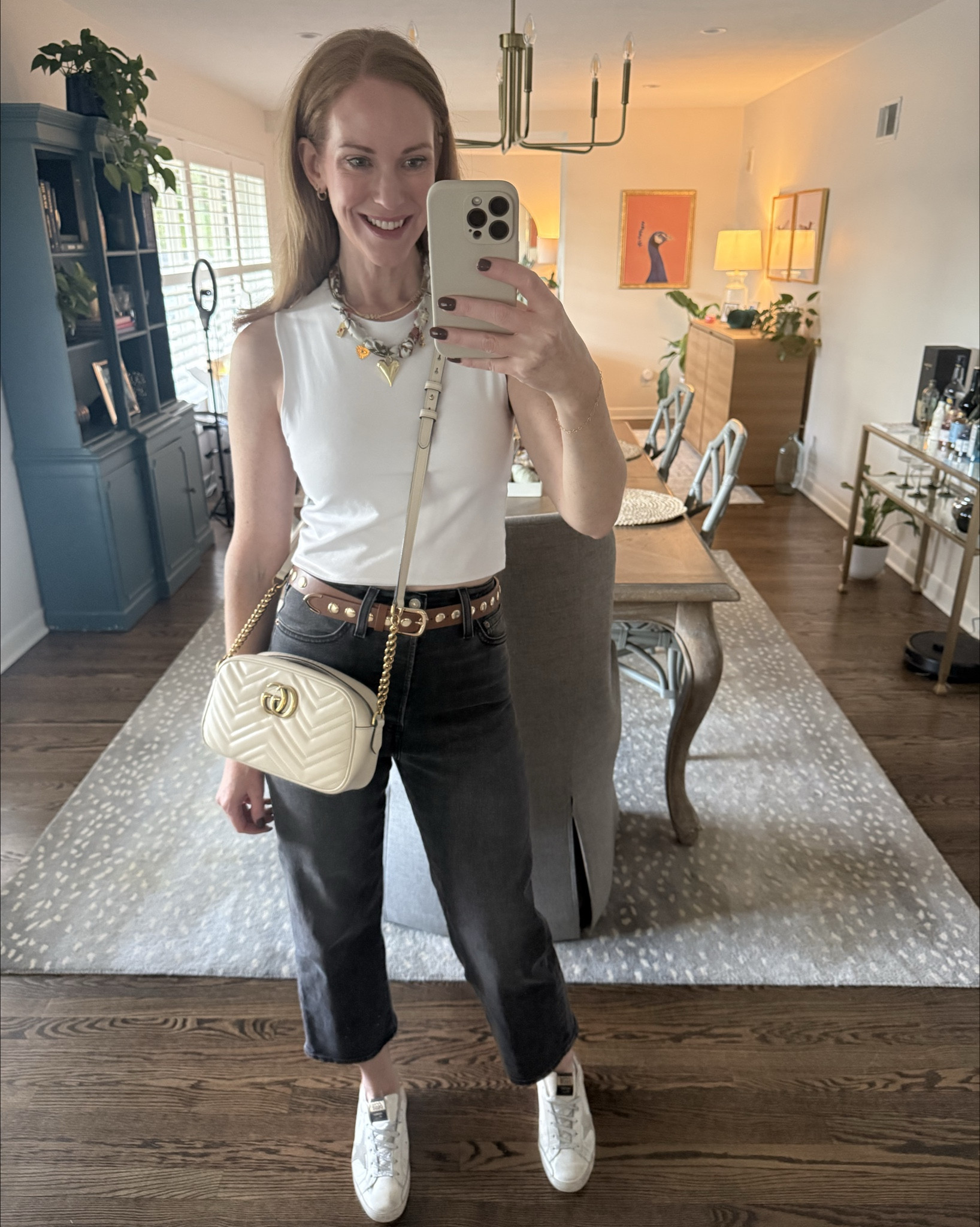 Friday night lights look! Hopefully I won’t embarrass the teens in these Levi jeans (that are sooo good) and a semi cropped tank. 😉

#LTKOver40 #LTKFindsUnder100 #LTKSeasonal