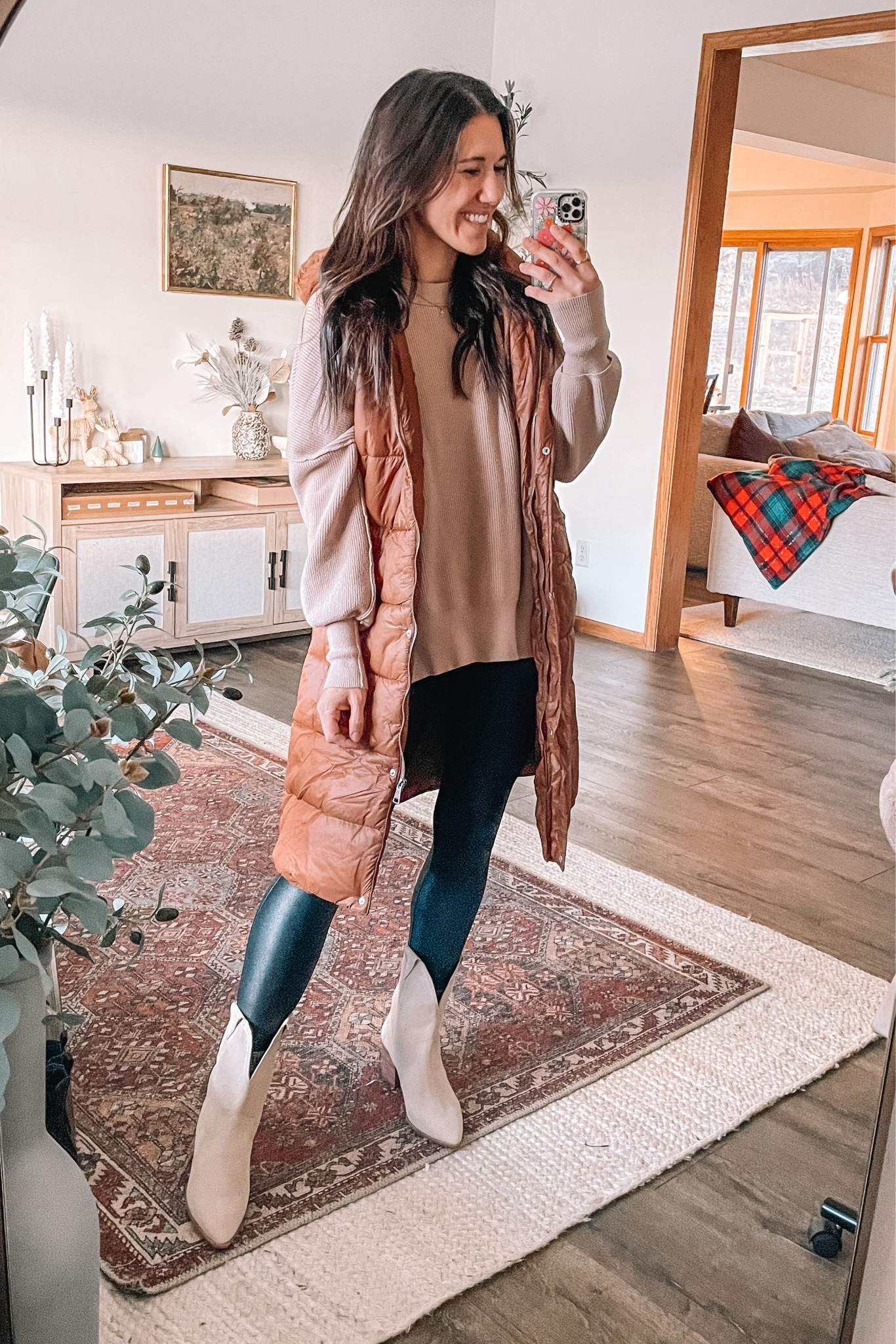 Casual winter outfit on sale!
Cyber Monday deals ⭐️ 

Amazon fashion free people look for less sweater, wearing medium 
Long puffer vest
Spanx look for less faux leather leggings 

Western boots, sized up to 10
Winter outfits 
Suede boots

#LTKCyberWeek #LTKstyletip #LTKshoecrush