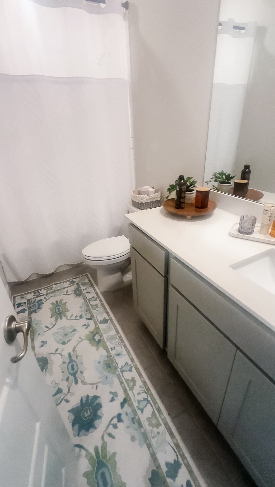 Guest bathroom vibes for the coming spring! I love how this Fame Rugs runner pulls both warm and cool, helping brighten up our small guest bathroom and giving you a happy surprise the moment you open the door! 

#LTKSeasonal #LTKHome