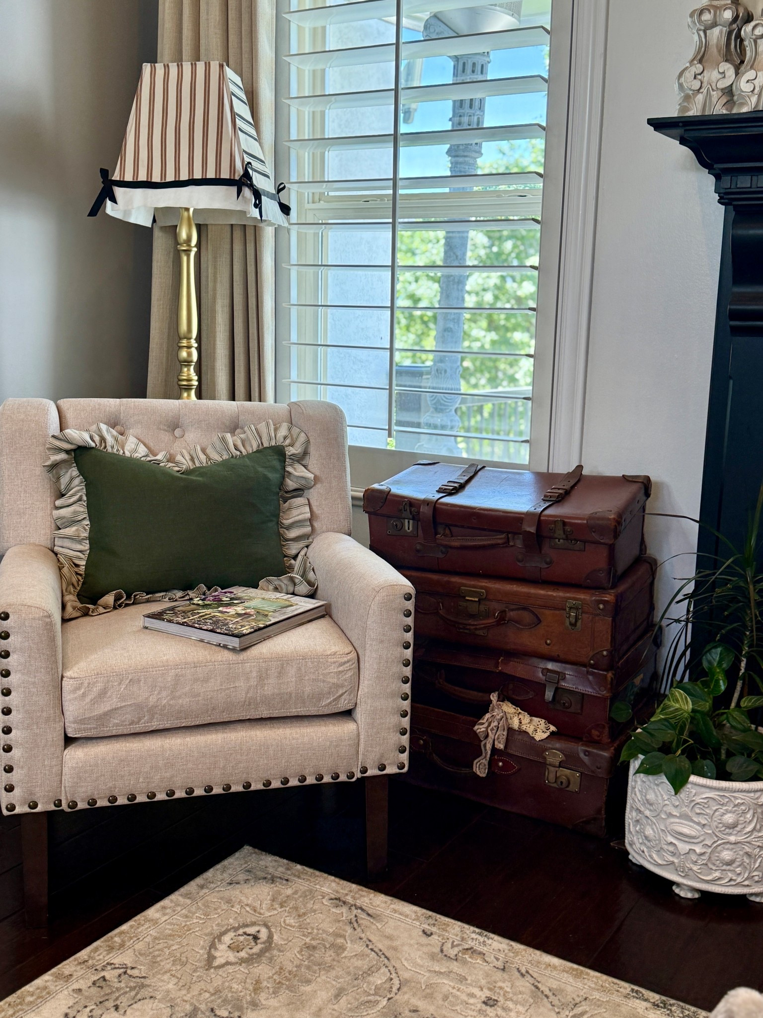 Amazon Finds
Paired with vintage finds for a cozy corner

Chair by Lou Bona  linen with nail head detail and wood legs, perfect for a little accent chair 

Coffee table book  - French County Cottage Bloom 

Affordable Curtains by Two Pages - custom made for your windows … let me tell you the quality of these is so high end, you’d never guess they were affordable and from Amazon 

Available in several fabrics, lined or unlined - black out available and several hanging options as well. 

Pillow by ruffles by Megan on Etsy (custom made to order)

Vintage suitcases 
Vintage standing lamp with custom stripe shade (linked similar)

Vintage pot with real plants (linked similar)