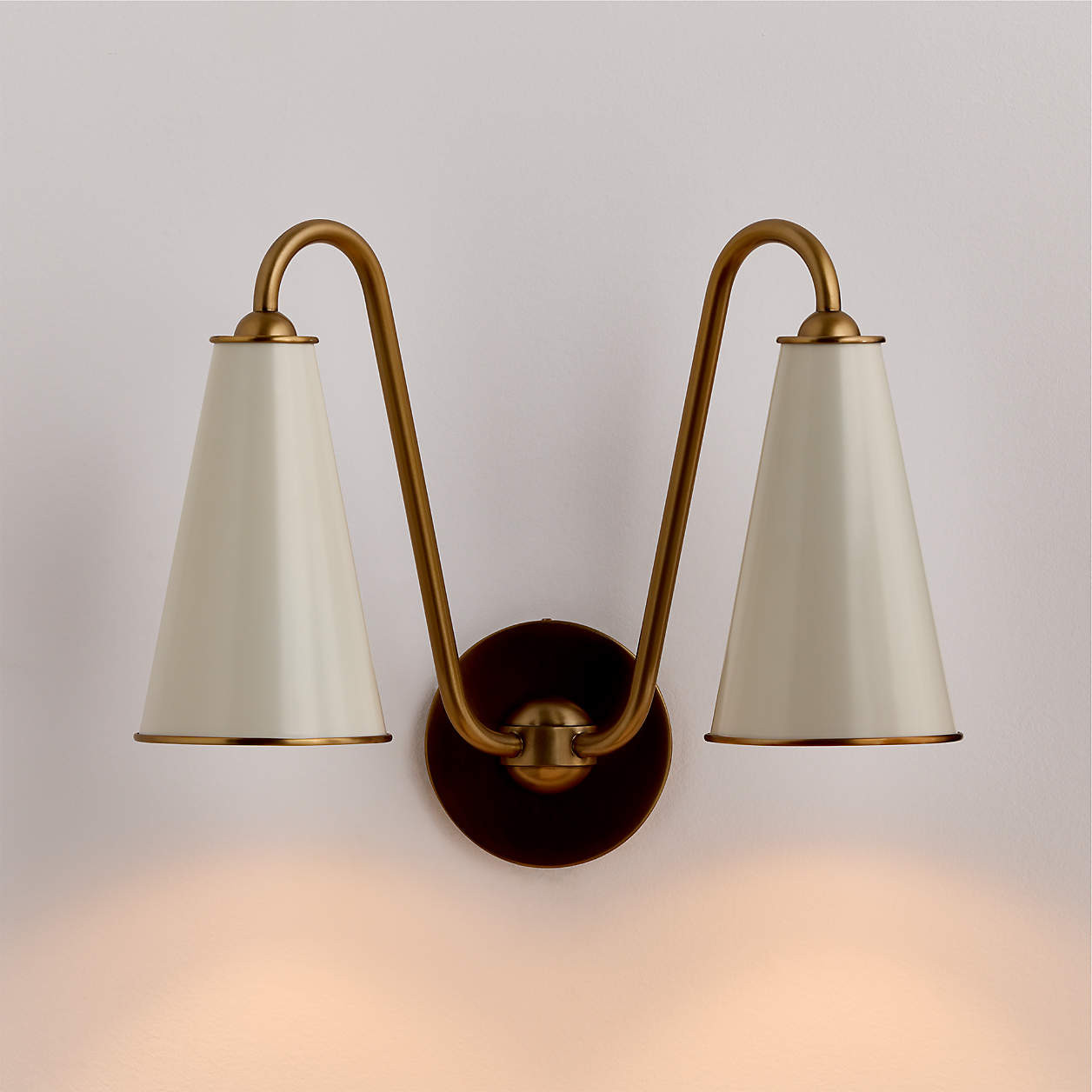 Everton Brass Double Wall Sconce Light with White Metal Shades | Crate & Barrel | Crate & Barrel