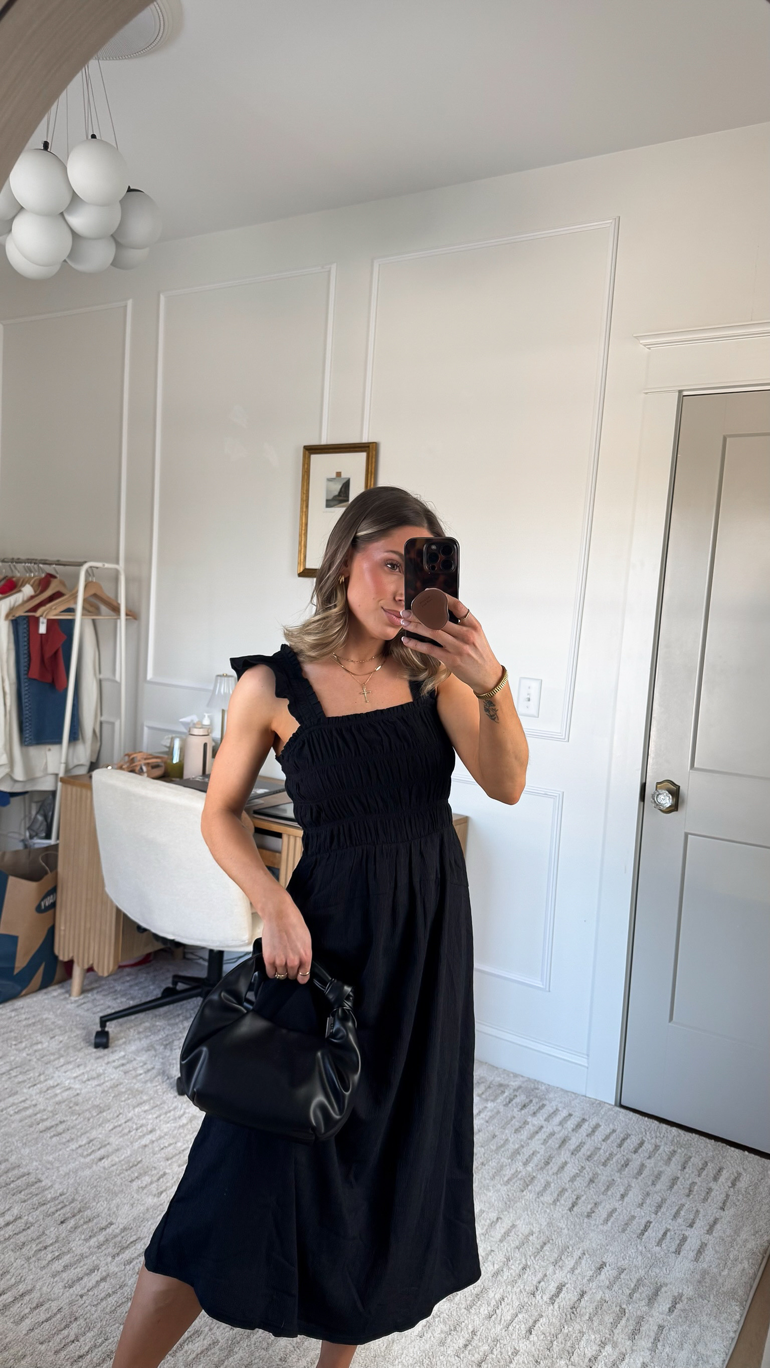 Simple black midi dress that is super lightweight! The ruffle sleeves add some texture and the mid section is smocked + stretchy. Wearing in an XS, comes in a few colors!  

 

#LTKSeasonal #LTKFindsUnder50 #LTKStyleTip
