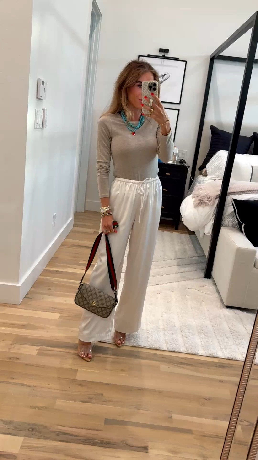 An easy workwear outfit or just an everyday elevated outfit. Love a neutral monochromatic look! Wearing xs in this oatmeal heather long sleeve and xxs short in these satin pants

#LTKOver40 #LTKootd #LTKWorkwear