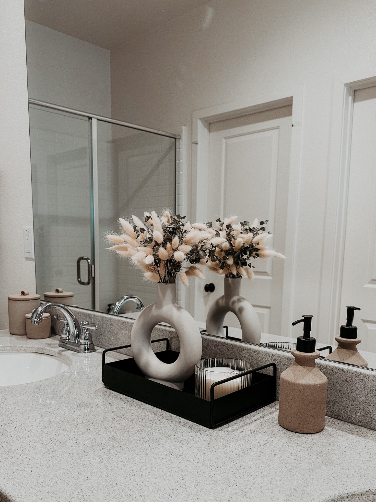 New black centerpiece tray with a beautiful ceramic vase and candle paired with a new ceramic soap dispenser. 

#LTKSeasonal #LTKhome #LTKHalloween