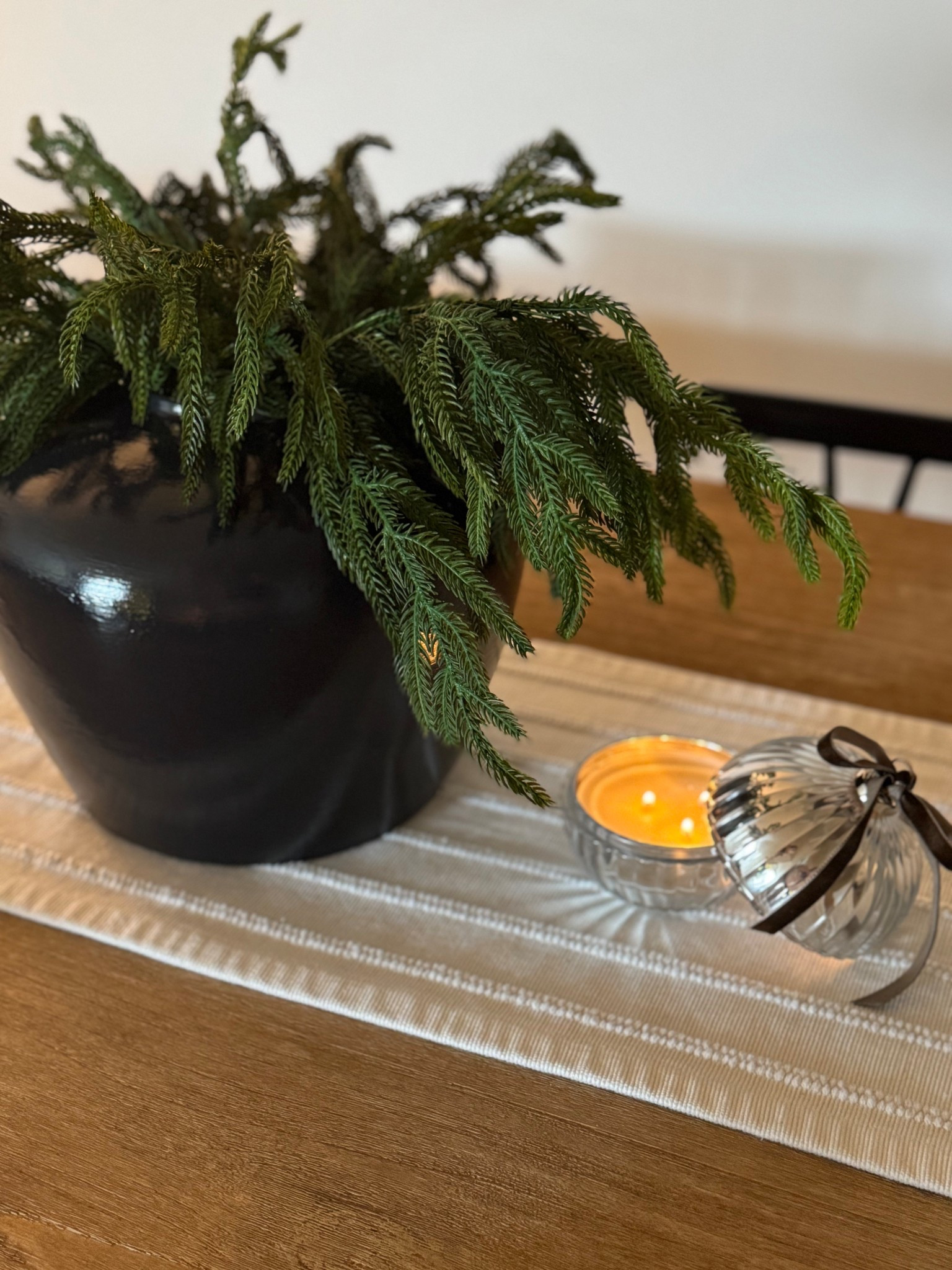 Norfolk pine stems, Afloral stems, Christmas dining room table, dark vase, ornament candle, cream runner

#LTKHome #LTKSaleAlert #LTKHoliday