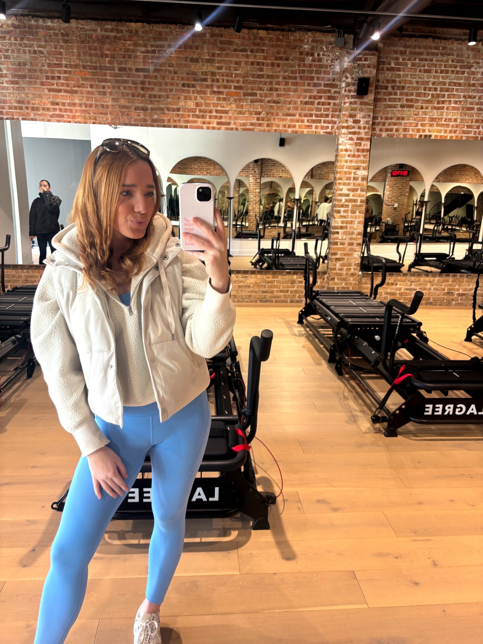 Back in the studio for class today! Spring is here wearing Lululemon leggings and Amazon vest with white sweatshirt! 