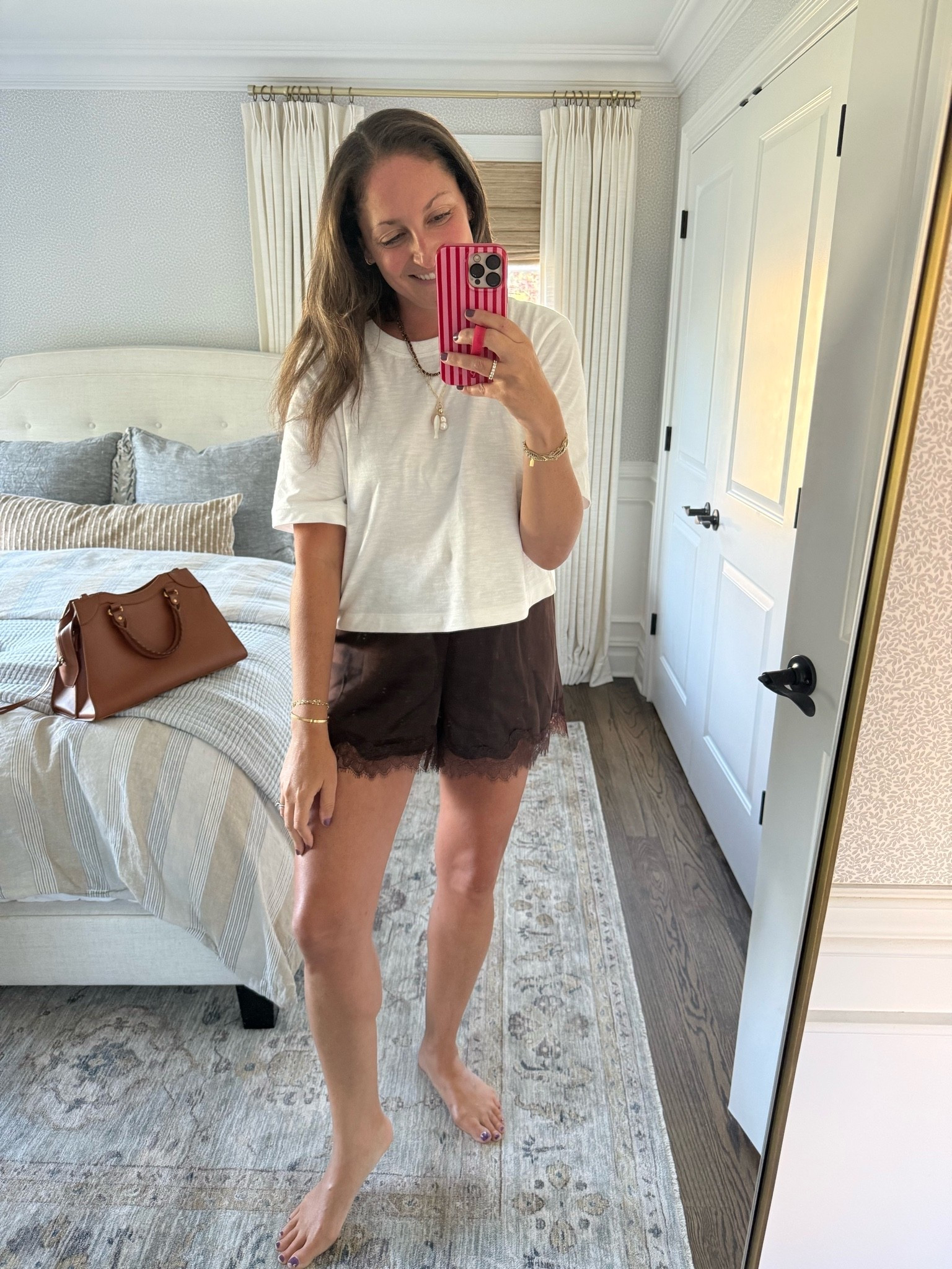 Friday’s OOTD! Love these silk shorts (a great @Target find!!), my favorite boxy tee and the charm necklace you’re going to want to customize and grab while it’s on sale!!

#LTKmomlife #LTKootd #LTKOver40