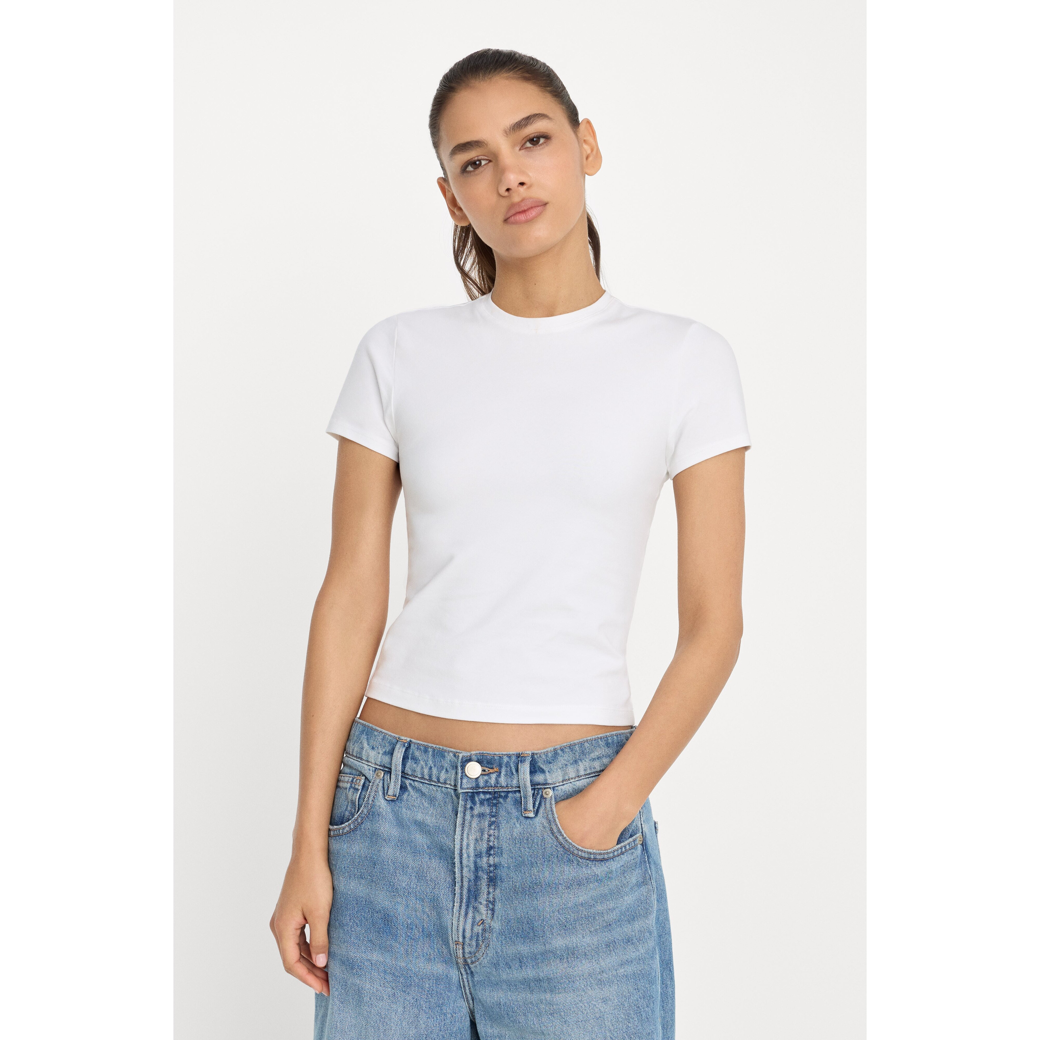 Women's Super Stretch Baby T-Shirt | White, Size Large | Good American by Khlo� Kardashian | Good American