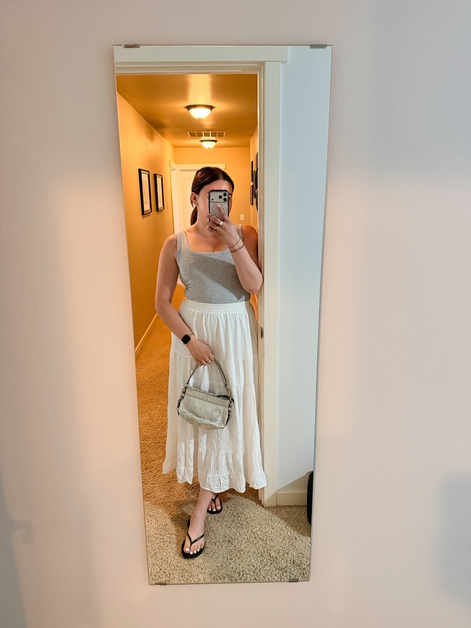 Visited my grandma while I was in my hometown and had to wear my fave white skirt! These are an essential for summer as they keep you cool and a white maxi skirt just goes with so much!

#LTKootd #LTKMidsize #LTKTravel