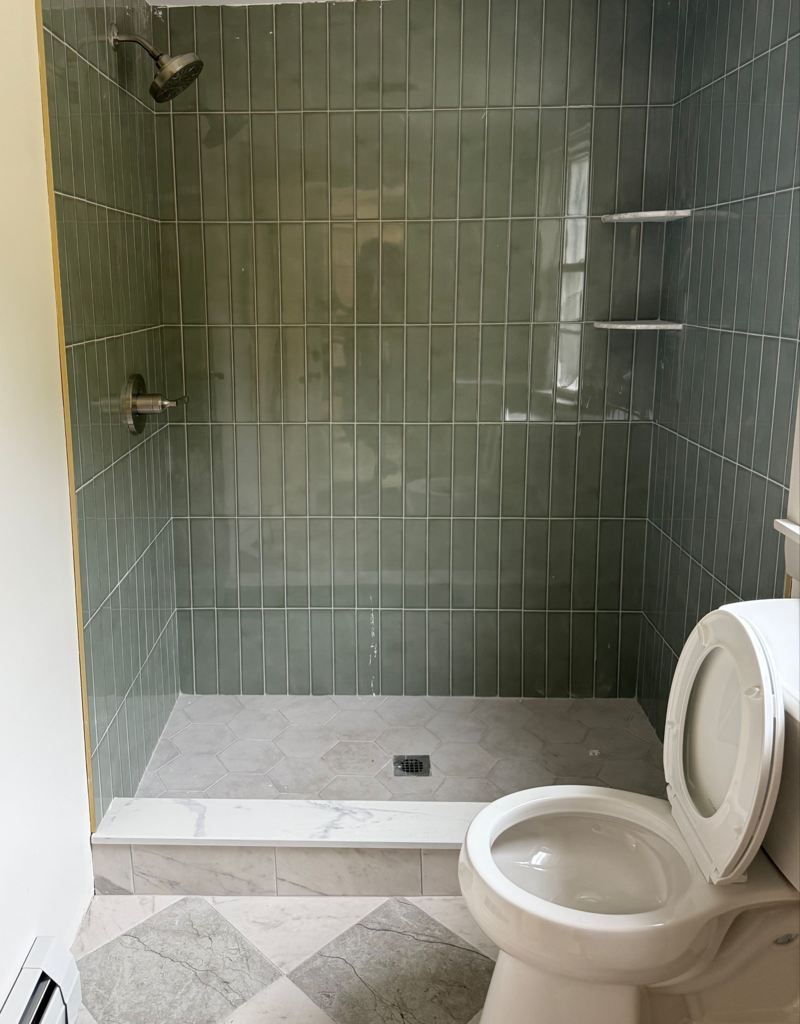 Bathroom renovation. Bathroom tile. Sage tile. Affordable bathroom. Checkered bathroom floor. 

#LTKHome