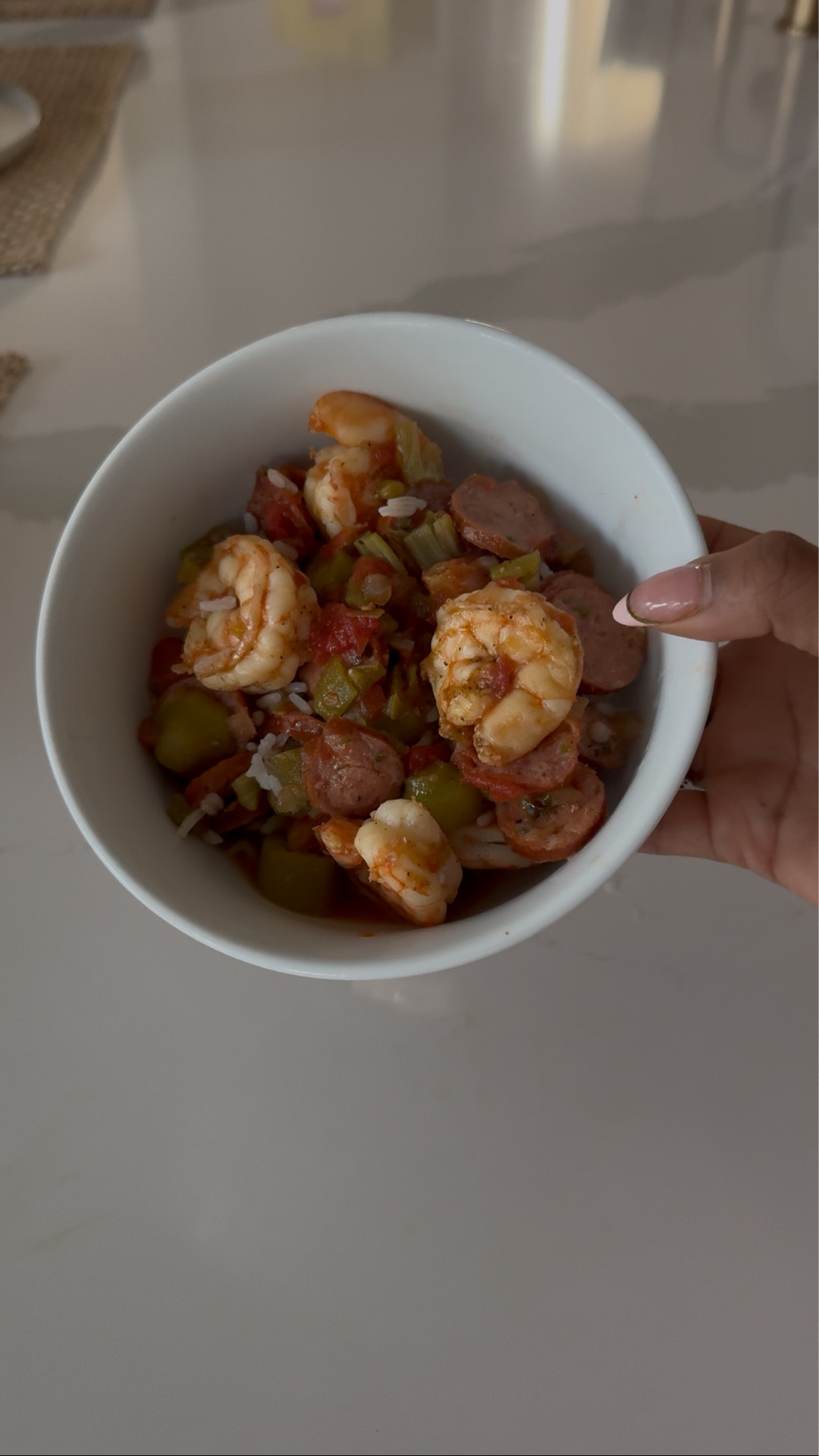 This creole okra shrimp and sausage meal is so so good and a family favorite. Recipe below: 

	•	2 tablespoons olive oil
	•	1 green bell pepper, chopped
	•	1 small onion, chopped
	•	2 (14.5 ounce) cans diced tomatoes
	•	3 cooked andouille sausage, cut into quarters
	•	1 (10 ounce) package frozen cut okra, thawed
	•	2 tablespoons Cajun seasoning, or to taste
	•	2 teaspoons salt
	•	2 pounds peeled and deveined medium shrimp (30-40 per pound)

Heat the olive oil in a skillet over medium heat. Stir in the bell pepper and onion; cook and stir until the onion has softened and turned translucent, about 5 minutes. Stir in the tomatoes and simmer for 10 minutes, then add the okra, sausage, Cajun seasoning, and salt. Cover and cook for 30 minutes. Stir in the shrimp and cook until they are bright pink on the outside and the meat is no longer transparent in the center, 8 to 12 minutes.