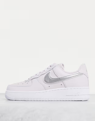 Nike Air Force 1 '07 essential trainers in purple and metallic silver swoosh | ASOS (Global)