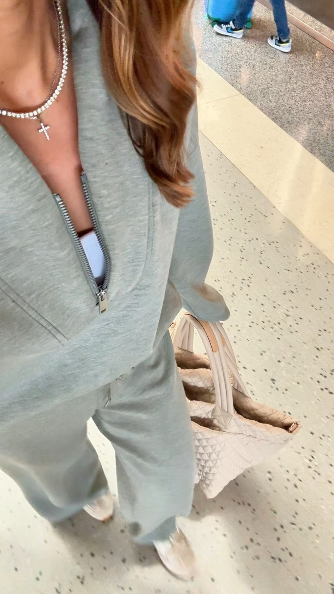 My travel outfit of the day! The best matching set in XS petite pants/XS in top. Airport outfit. Gucci Mercato tote large. Tory Burch field sneakers - i went up half a size. LISAMARIEXSPANX for 15% off first order & free shipping.

#LTKgrwm #LTKTravel #LTKootd