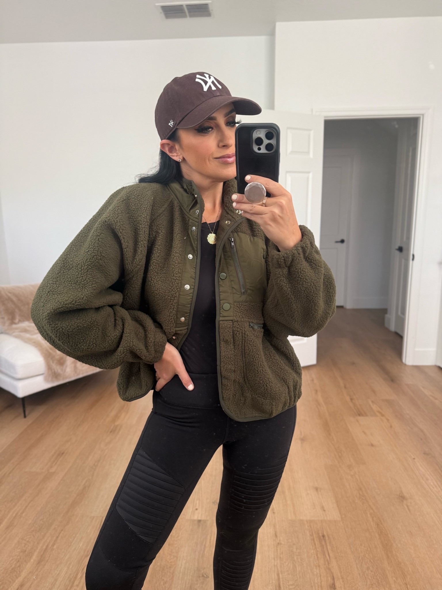 Fuzzy Fleece Jacket wearing size medium. Alo moto leggings.