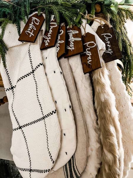 Christmas mantle decor
Stocking name tags
Small shop
Garland
Stockings 

#LTKHoliday #LTKhome #LTKSeasonal