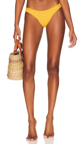 Whiplash Bikini Bottom in Sunshine Gold | Revolve Clothing (Global)