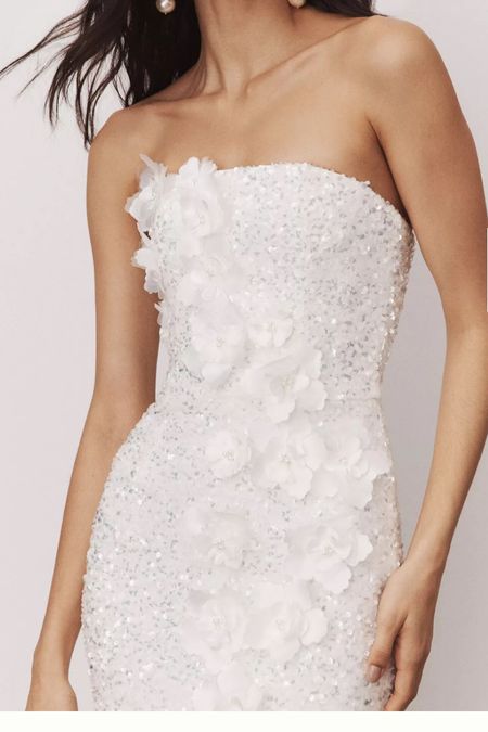 Beautiful white dress with floral beading 


#LTKwedding #LTKSeasonal #LTKstyletip