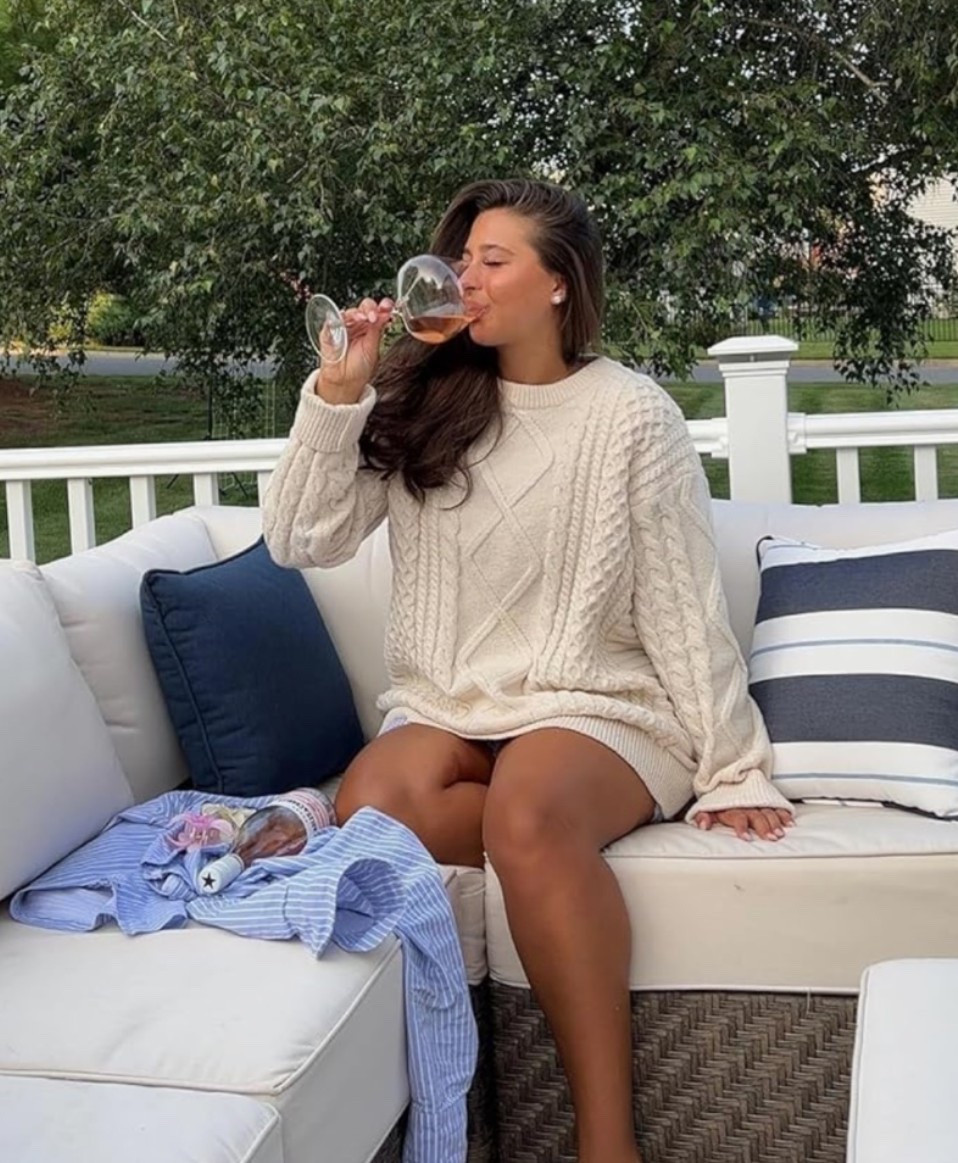 Oversized knit sweater with that relaxed coastal evening feel you want after a long summer day. 🍷 🌊 Perfect with boxer shorts out on the new patio furniture set, beach house mornings, cool nights by the water, vacation lounging, wine outside, or slow weekends when you want something cozy but still effortlessly styled. The vintage-inspired knit, woven texture, and unisex oversized fit make it feel easy, comfortable, and timeless. 

Grab this sweater if your summer nights need that perfect throw-on layer for every coastal evening of the season. ☀️🦀🏖️

#LTKOver40 #LTKHome #LTKMidsize