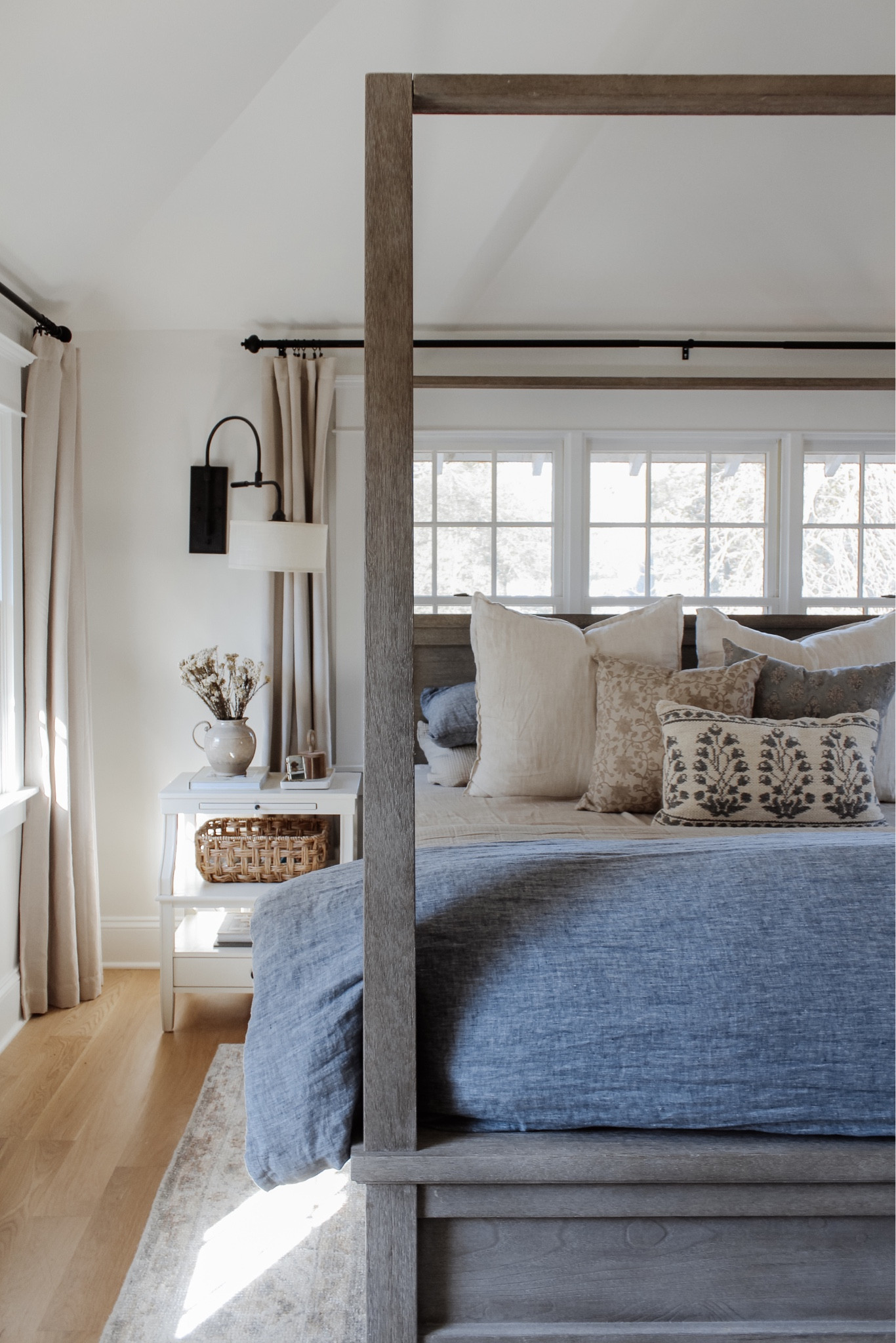 Settling into our new normal and I’m excited to reflect back on the month - starting with all of the affordable new arrivals I found for you. Shop the latest Decor Edit that is full of new items from top retailers on the blog ☺️
•
Shop my bedroom and the post from the link in bio. Message me with any questions!
•
•
•
4 poster wood bed, natural tone wood bed, canopy bed, linen duvet, stripe euro shams, floral decorative pillow, bed pillows, pillow inserts, cotton gauze quilts, layered bedding, nightstand decor, white two shelf nightstand, affordable furniture, quick ship furniture, swing light, nightstand wall light, affordable curtain, neutral bedroom, bedroom decor, black curtain rod, vintage decor, Target home, woven basket, lumbar pillow, floral throw pillow cover, blue bedding  
