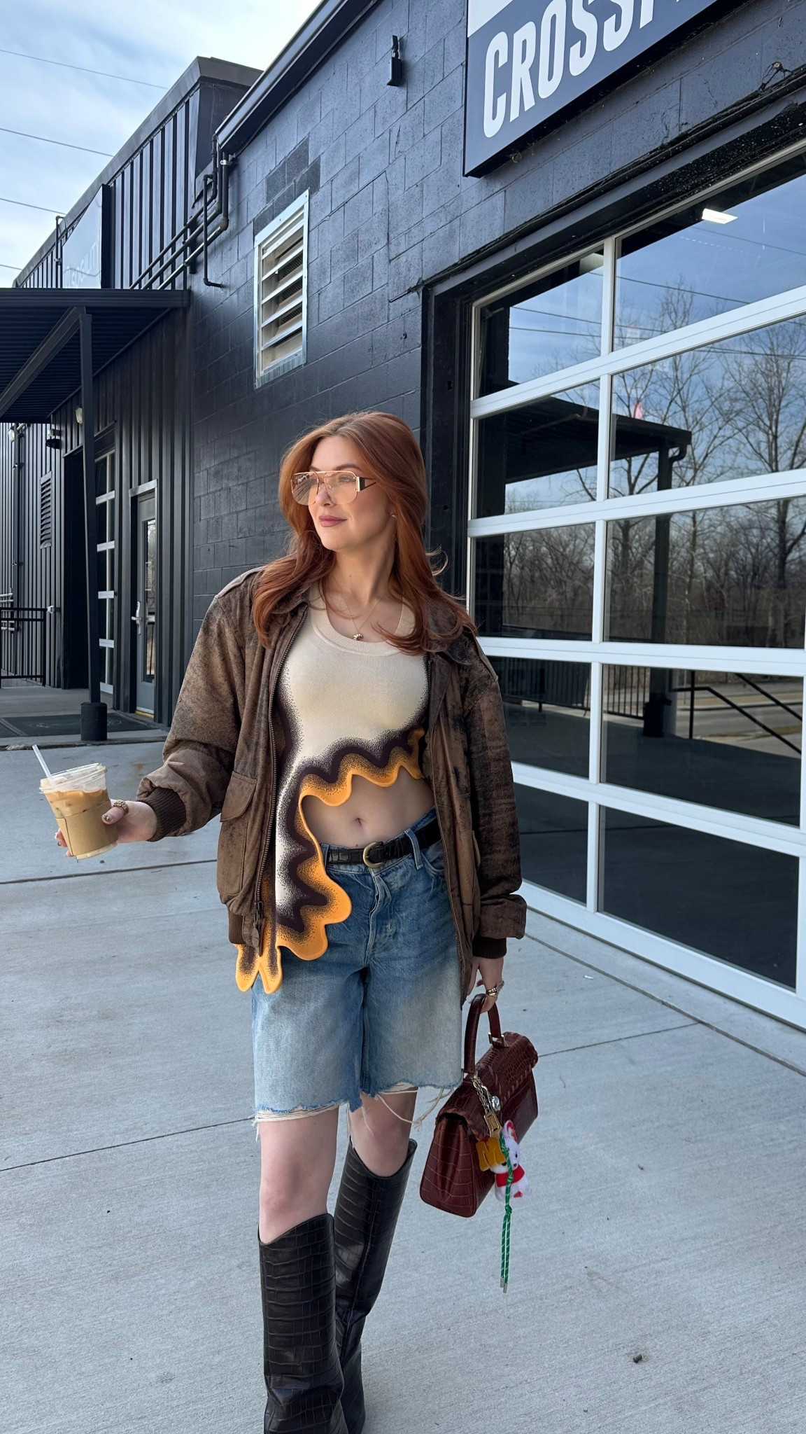 In between season outfit featuring long jorts, vintage leather bombers, and unique crop tops

#LTKStyleTip