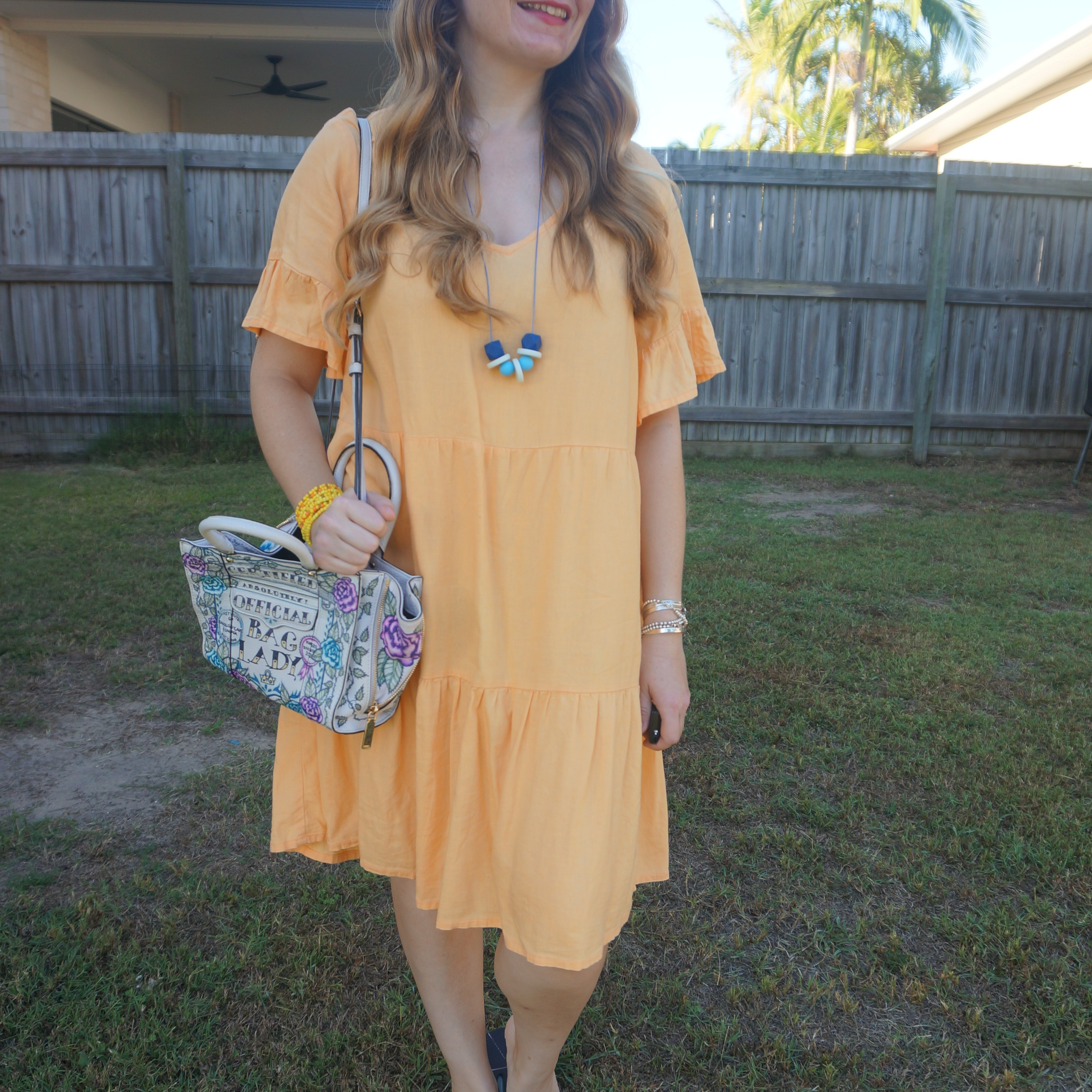 Anko Kmart papaya yellow tiered linen dress with hand painted Rebecca Minkoff mini MAB tote bag 💛

#LTKaustralia #LTKbag #LTKdresses