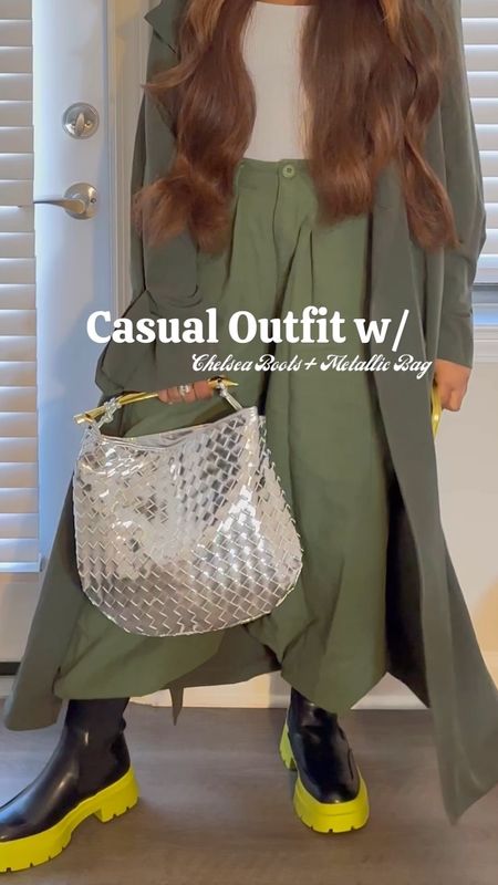 Boots are on my mind for fall but I decided to do something different by wearing these black and lime green Chelsea boots. To really create a different texture, I added a silver metallic bag! 

To try your hand at mixing and matching, here are some Chelsea boots + metallic bags to snag!

#LTKfindsunder100 #LTKVideo #LTKSeasonal