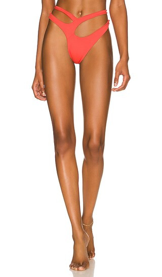 Cora Cutaway Bikini Bottom in Coral | Revolve Clothing (Global)