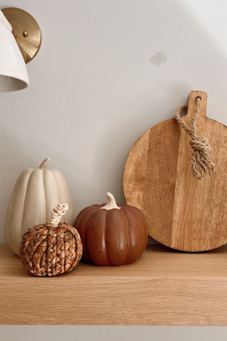 The cutest fall decor comes from target! I used these pieces to decorate our kitchen shelves for fall and I love how everything came out. The ceramic pumpkins, woven pumpkins, and wooden serve board all pair perfectly together! 

#LTKhome #LTKunder50 #LTKSeasonal