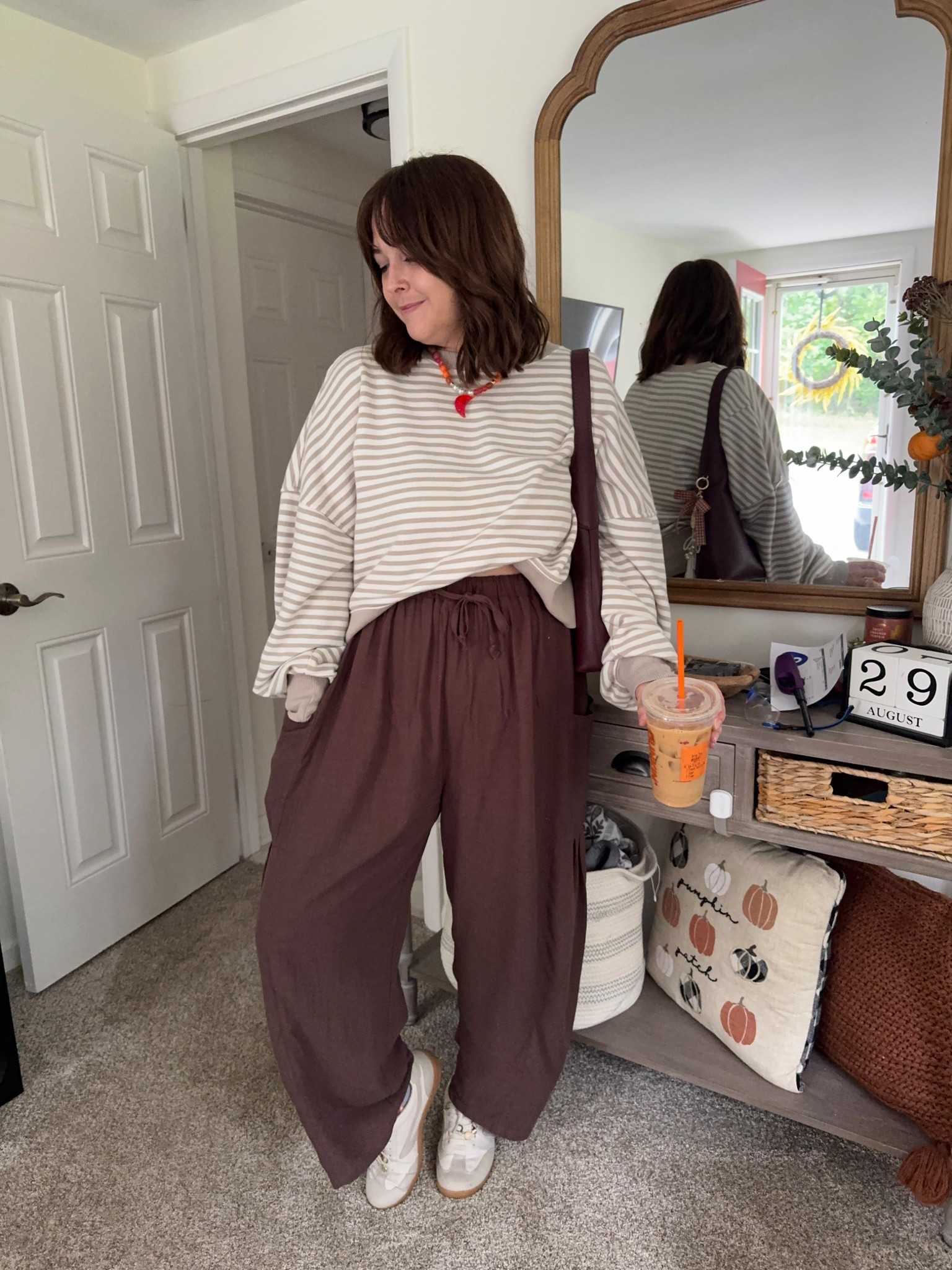 Today’s fall outfit for the cooler morning! Barrel leg pants and a cropped striped sweatshirt.

I linked a similar one on Amazon.

Cropped sweatshirt: size medium. I typically wear larges

Brown Barrel leg pants: wearing a medium. Typically a large in bottoms

#LTKMidsize #LTKSaleAlert #LTKSeasonal