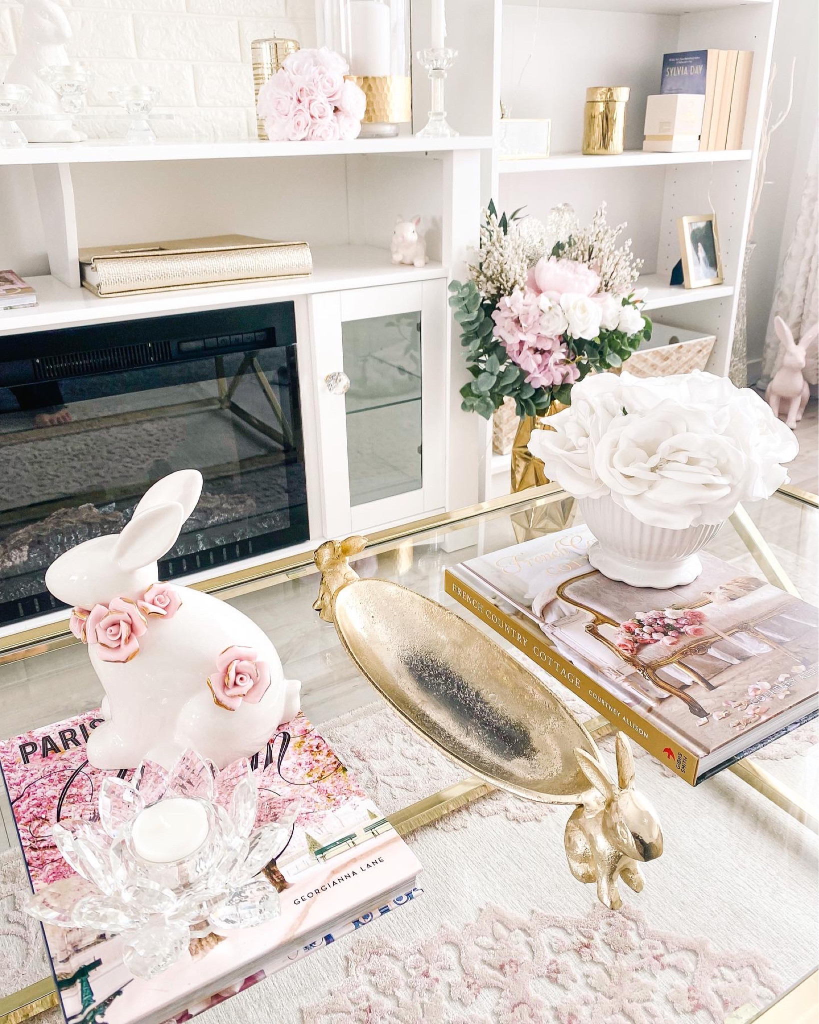 Spring 𝓬𝓸𝓯𝓯𝓮𝓮 𝓽𝓪𝓫𝓵𝓮 styling in the living room. ⚜️☕️🐇🌸

I’m in love with this new gold bunny serving tray from HomeSense! See other gorgeous trays I’ve linked below!

#LTKstyletip #LTKhome #LTKSeasonal