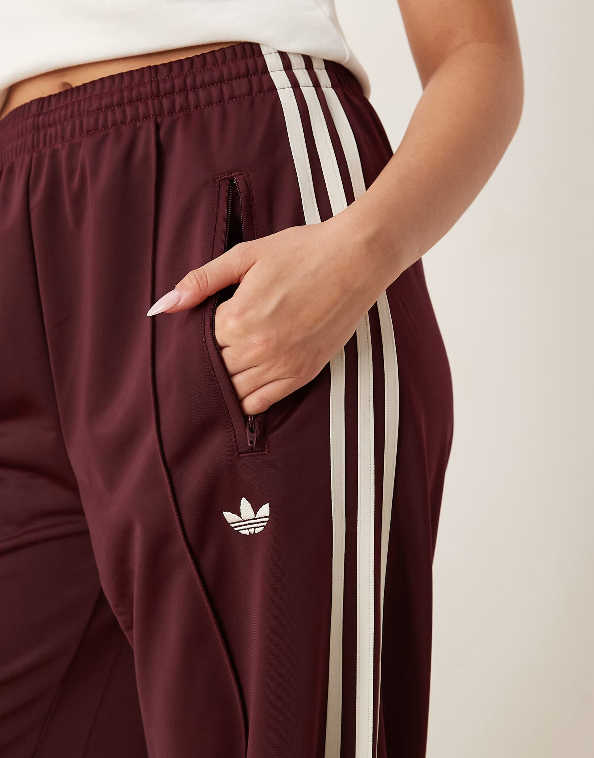 adidas Originals Firebird Loose track pants in burgundy | ASOS | ASOS (Global)