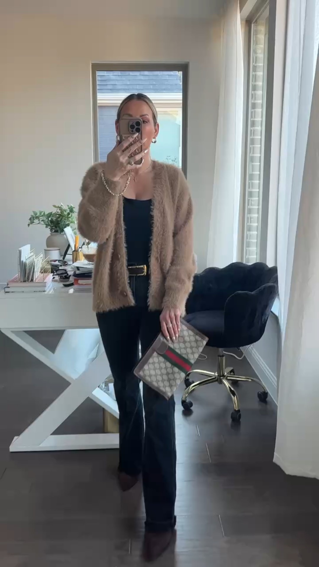 This outfit is my go-to formula lately for looking polished without trying too hard 🤎

A sleek black bodysuit and dark high-rise flares create that long, clean base, then I layered this cozy textured cardigan for warmth and softness. The gold-buckle belt and pointed boots sharpen everything up, and my vintage Gucci clutch adds that quiet designer touch.

It’s the easiest way to mix Amazon basics with luxe accessories and still look elevated.

Perfect for everyday errands, casual dinners, or those “I want to look put together but comfortable” days — aka real life.

Wearing an Amazon bodysuit, VICI flare jeans, an Amazon fuzzy cardigan, Amazon pointed boots, a Madewell leather belt, and my vintage Gucci bag. All the affordable pieces are linked here ✨

#ltkstyle #amazonfashion #over40style #highlowfashion #elevatedeveryday


#LTKgrwm #LTKootd #LTKmorningroutine