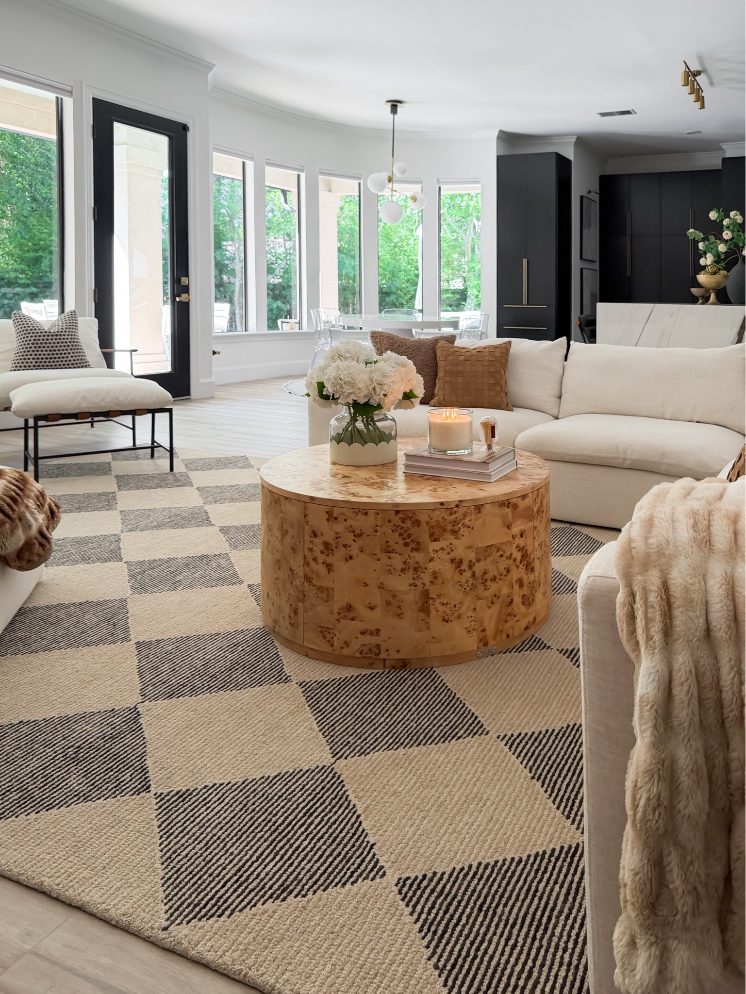 I can’t get over how much this new Loloi x Chris Loves Julia Francis rug transformed our living room 🤍. This is the beige / charcoal colorway. 

I’ve been eyeing this beige/charcoal checkered rug since we moved into this house, and it was exactly what this space needed to finally pull everything together. The texture, pattern, and cozy feel are SO good.

And the best part? It’s currently over 50% OFF 👏 on @Wayfair 

If you’ve been looking for a neutral checkered rug, cozy living room inspo, or affordable designer-style rugs, this is your sign. 

#cljxloloi #loloirugs