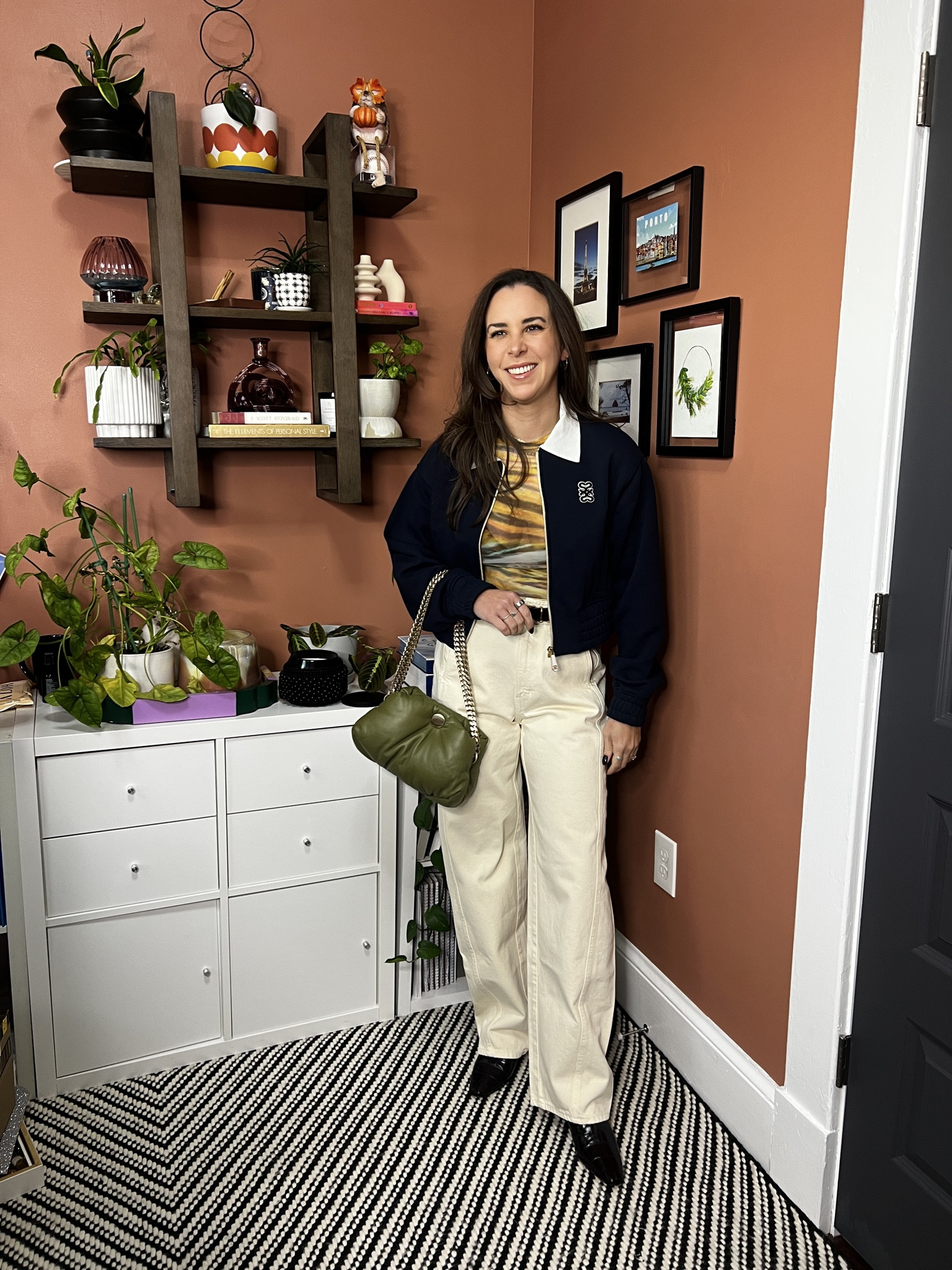 green lether bag. green bag. proenze schouler. cream jeans. ecru jeans. leather boots. croc embossed boots. croc boots. bomber jacket. printed top. sheer top. casual outfit. casual style. inspo. fall outfit.  

 #LTKootd #LTKSaleAlert #LTKFindsUnder100