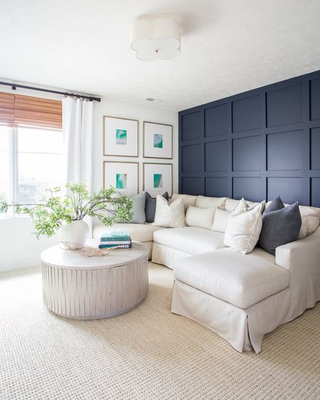 *Coffee table restock alert * Our Omaha updated cozy den with a linen sectional, linen blackout drapes, woven bamboo window coverings, faux greenery, a round wood coffee table styled with coastal decor, an oversized gallery wall, and spring pillows! See more of this space here: https://lifeonvirginiastreet.com/benjamin-moore-hale-navy/.

#ltkhome #ltksalealert #ltkstyletip #ltkseasonal #ltkfamily #ltkfindsunder50

#LTKsalealert #LTKhome #LTKSeasonal